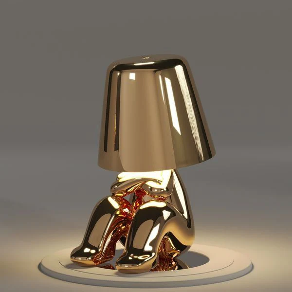 Kabellose Tischlampe mit skulpturalem Figurendesign und warmem Licht