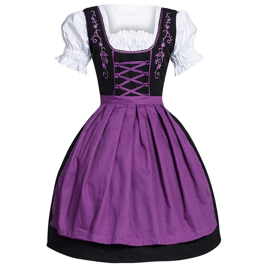 Traditionelles Dirndlkleid mit Schürze in bunten Farben