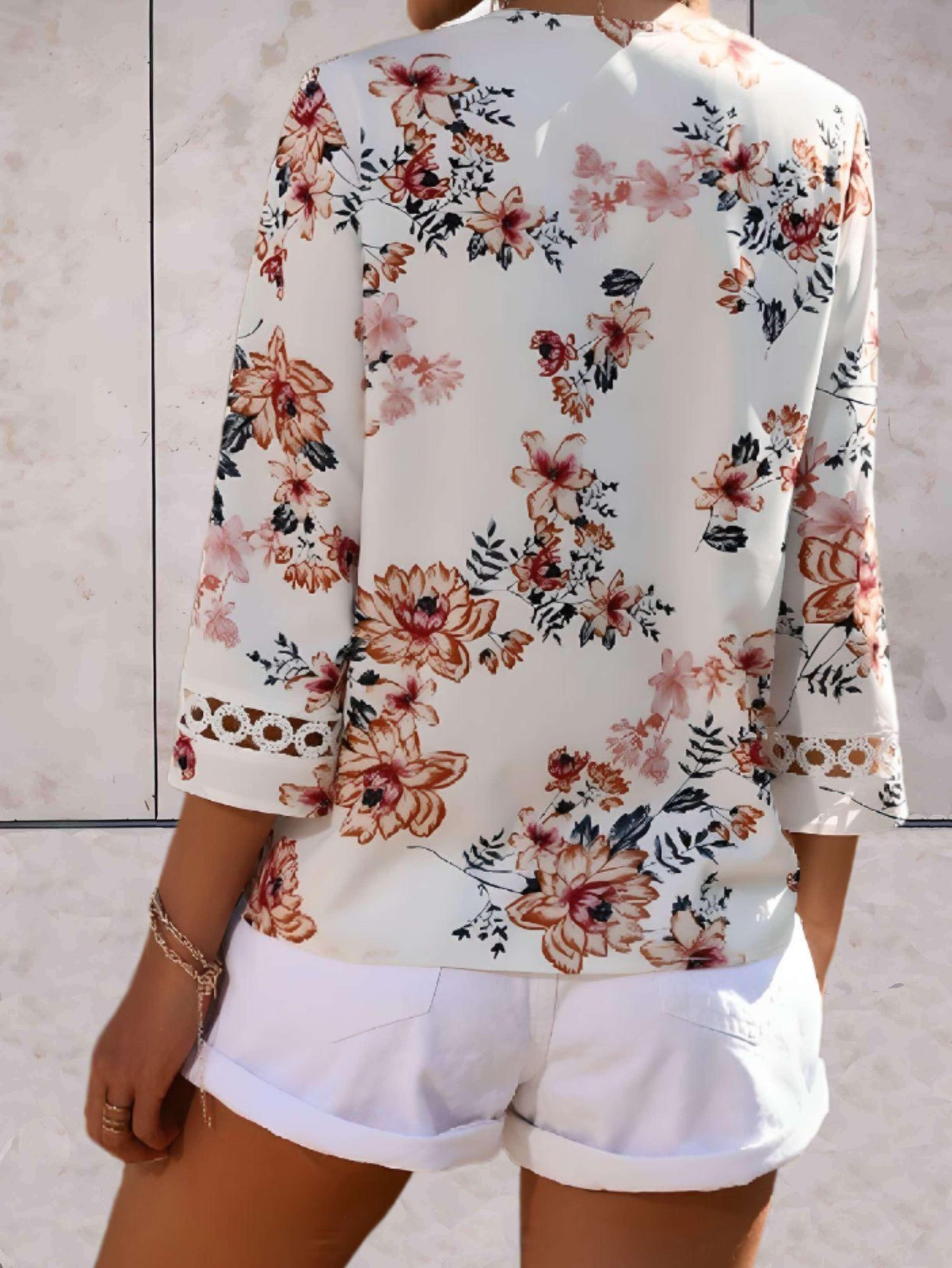 Damen V-Ausschnitt Bluse mit Blumenmuster und halblangen Ärmeln