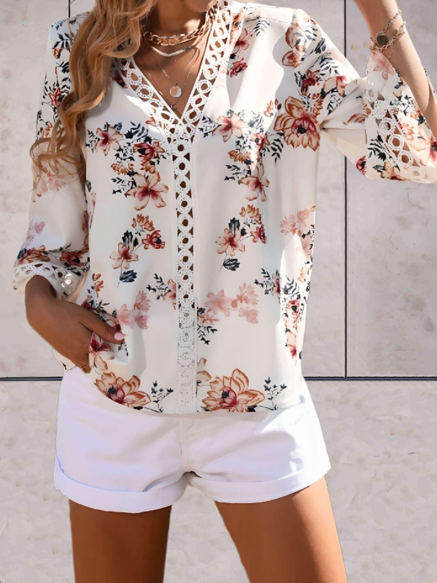 Damen V-Ausschnitt Bluse mit Blumenmuster und halblangen Ärmeln