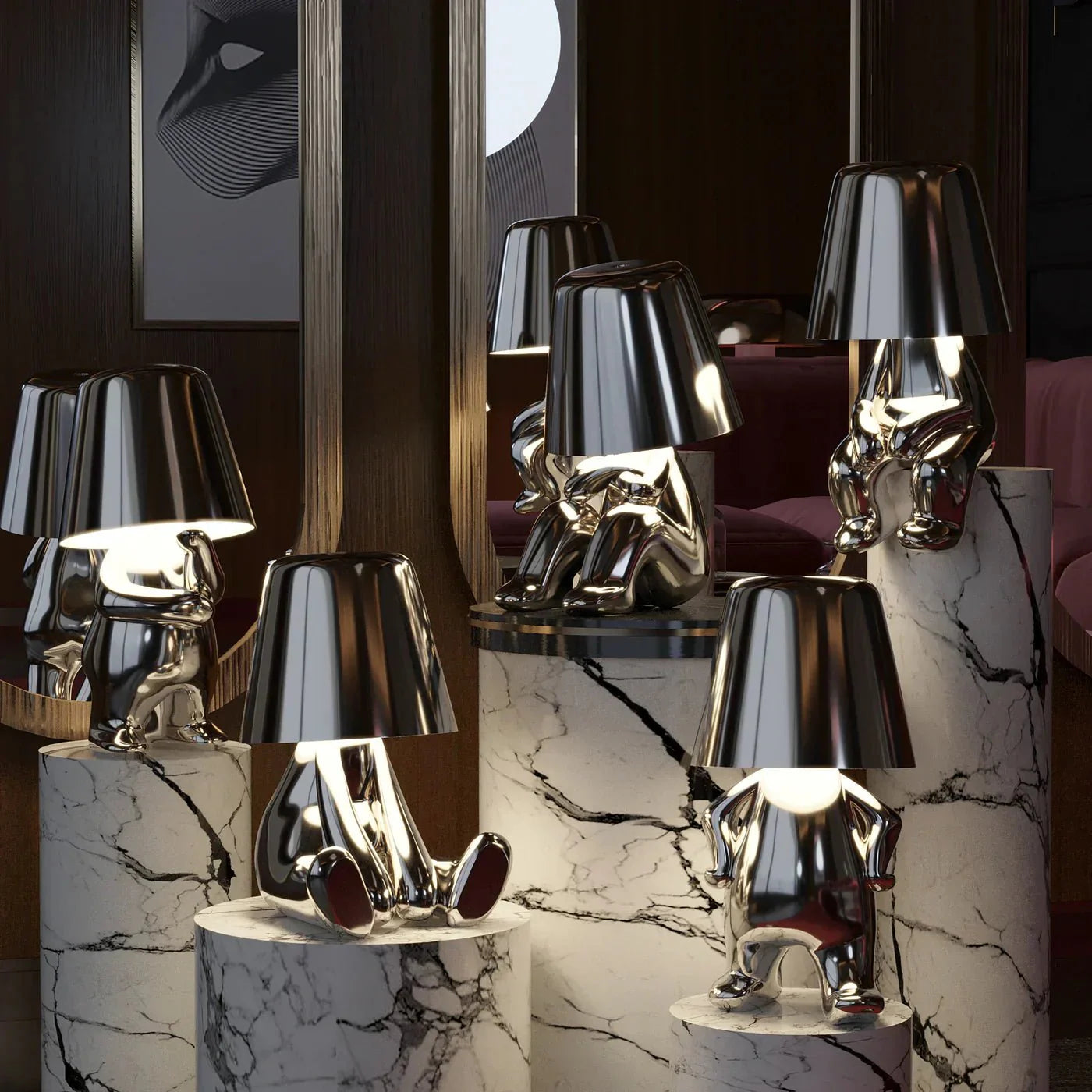 Kabellose Tischlampe mit skulpturalem Figurendesign und warmem Licht