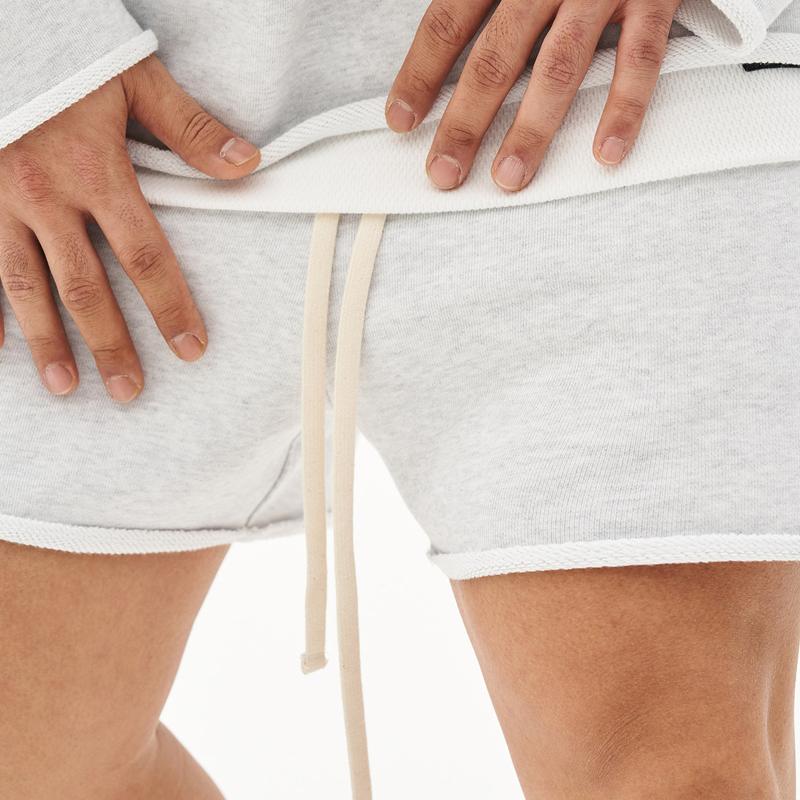 Herren Baumwoll-Shorts mit Rohkanten und Loose Fit
