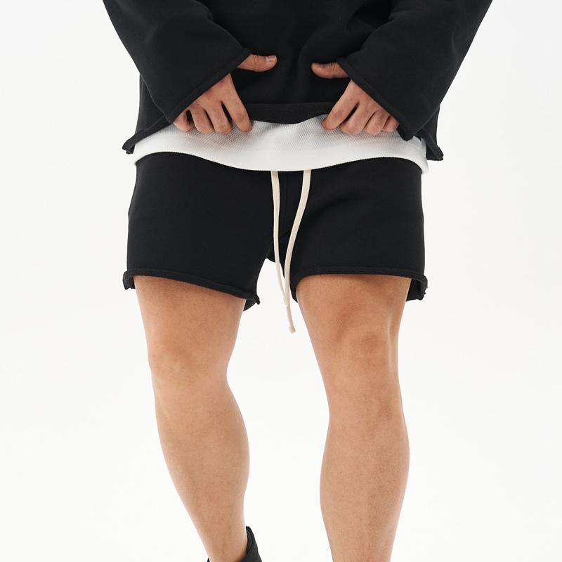 Herren Baumwoll-Shorts mit Rohkanten und Loose Fit