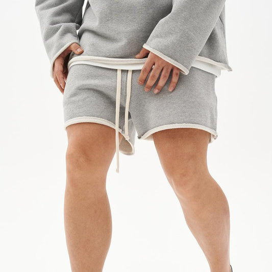 Herren Baumwoll-Shorts mit Rohkanten und Loose Fit