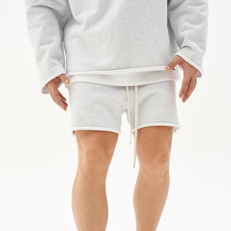 Herren Baumwoll-Shorts mit Rohkanten und Loose Fit
