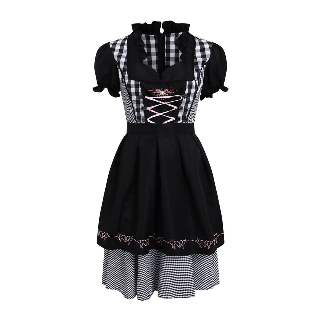 Traditionelles kariertes Dirndlkleid mit Stickereien für das Oktoberfest