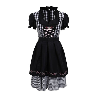 Traditionelles kariertes Dirndlkleid mit Stickereien für das Oktoberfest