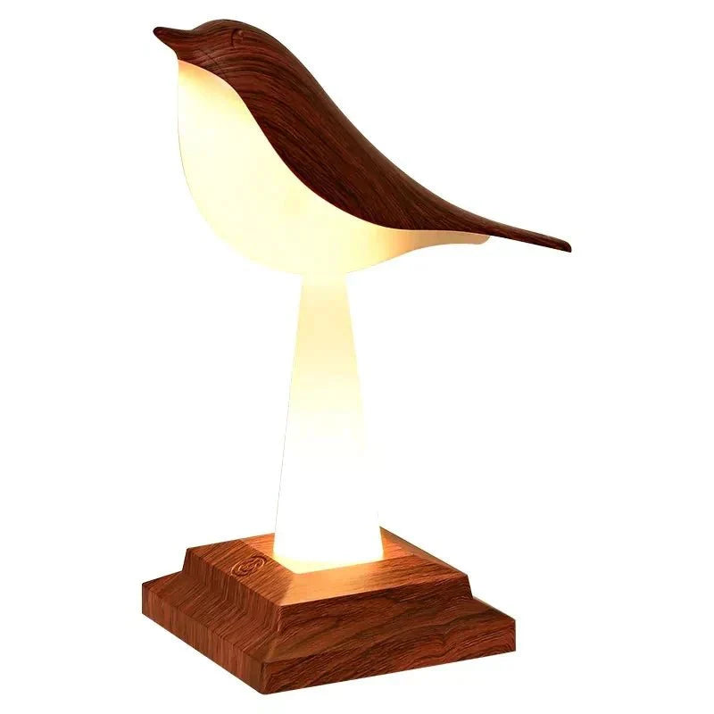 Kabellose LED-Tischlampe in Vogeloptik aus Holz mit warmem Licht