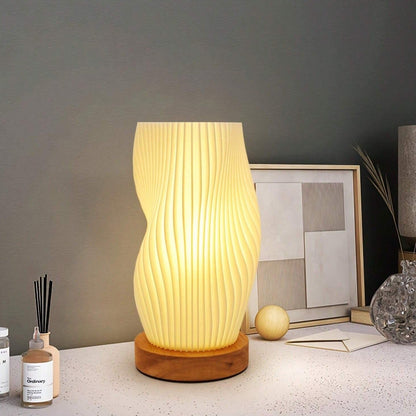 Kabellose Tischlampe mit wellenförmigem Design und sanftem Licht