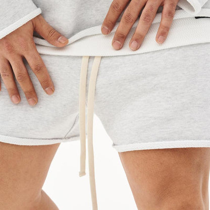 Herren Baumwoll-Shorts mit Rohkanten und Loose Fit