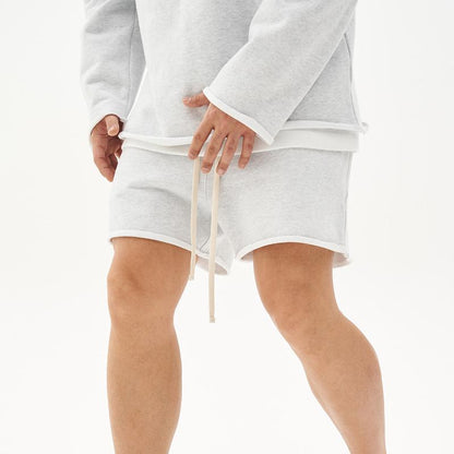 Herren Baumwoll-Shorts mit Rohkanten und Loose Fit